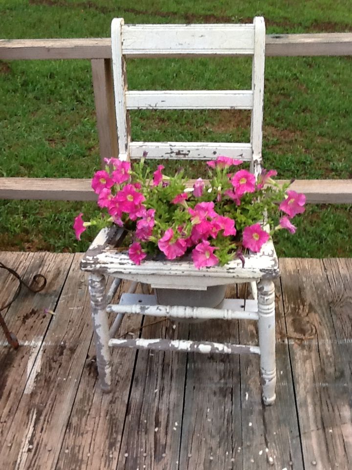 Old Bucket Chair Planter