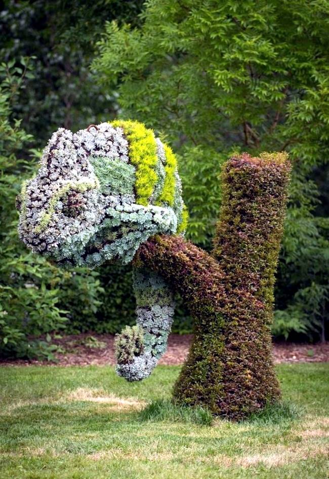 Four Colossal Head Sculptures