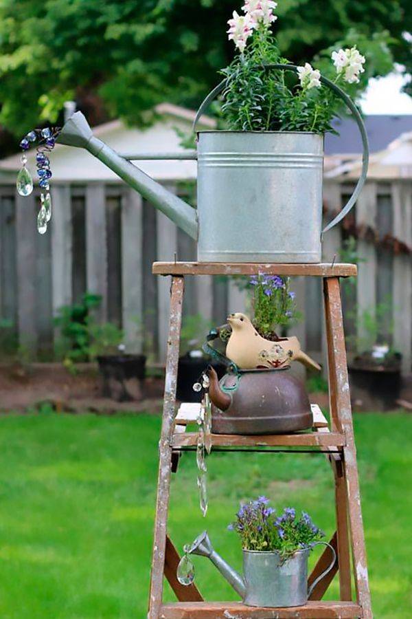 Creative Watering Can Garden Art Ideas