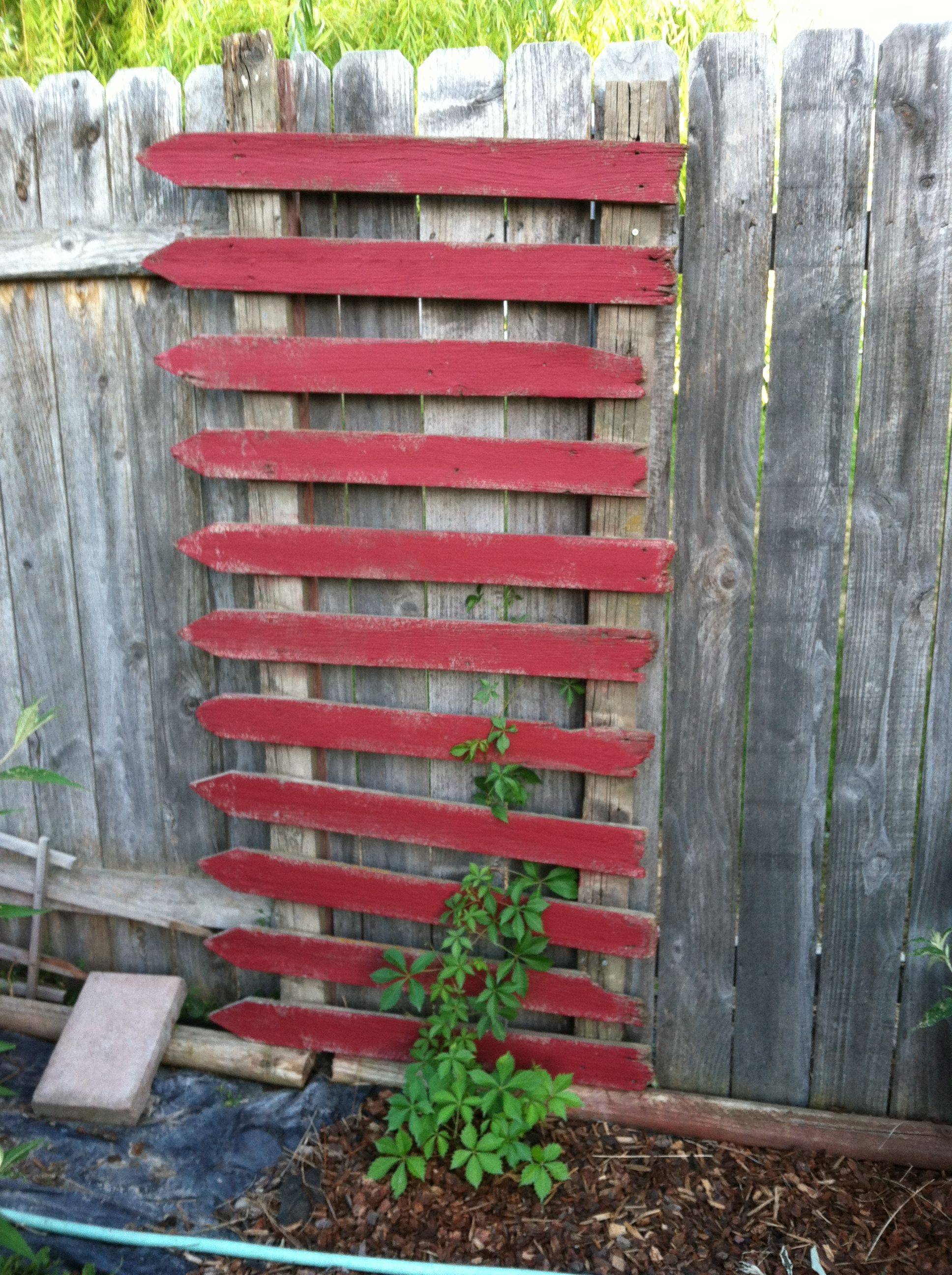 An Old White Picket Fence And Garden Gate