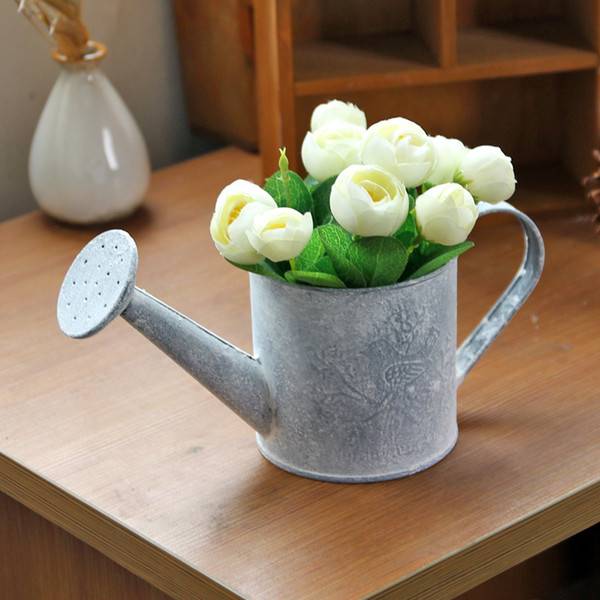 Creative Watering Can Garden Art Ideas