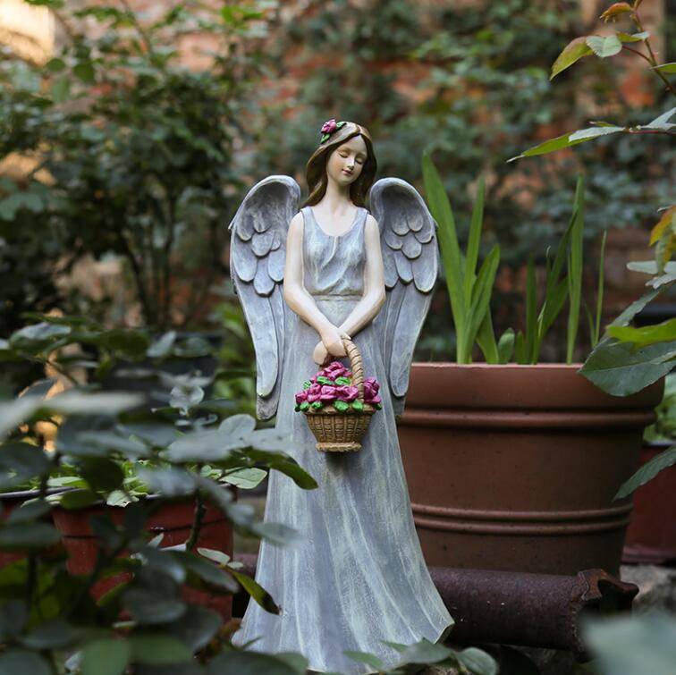 Angel Holding Flowers