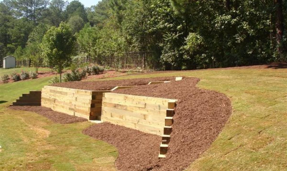 Pressure Treated Retaining Wall With Horizontal Redwood Facing