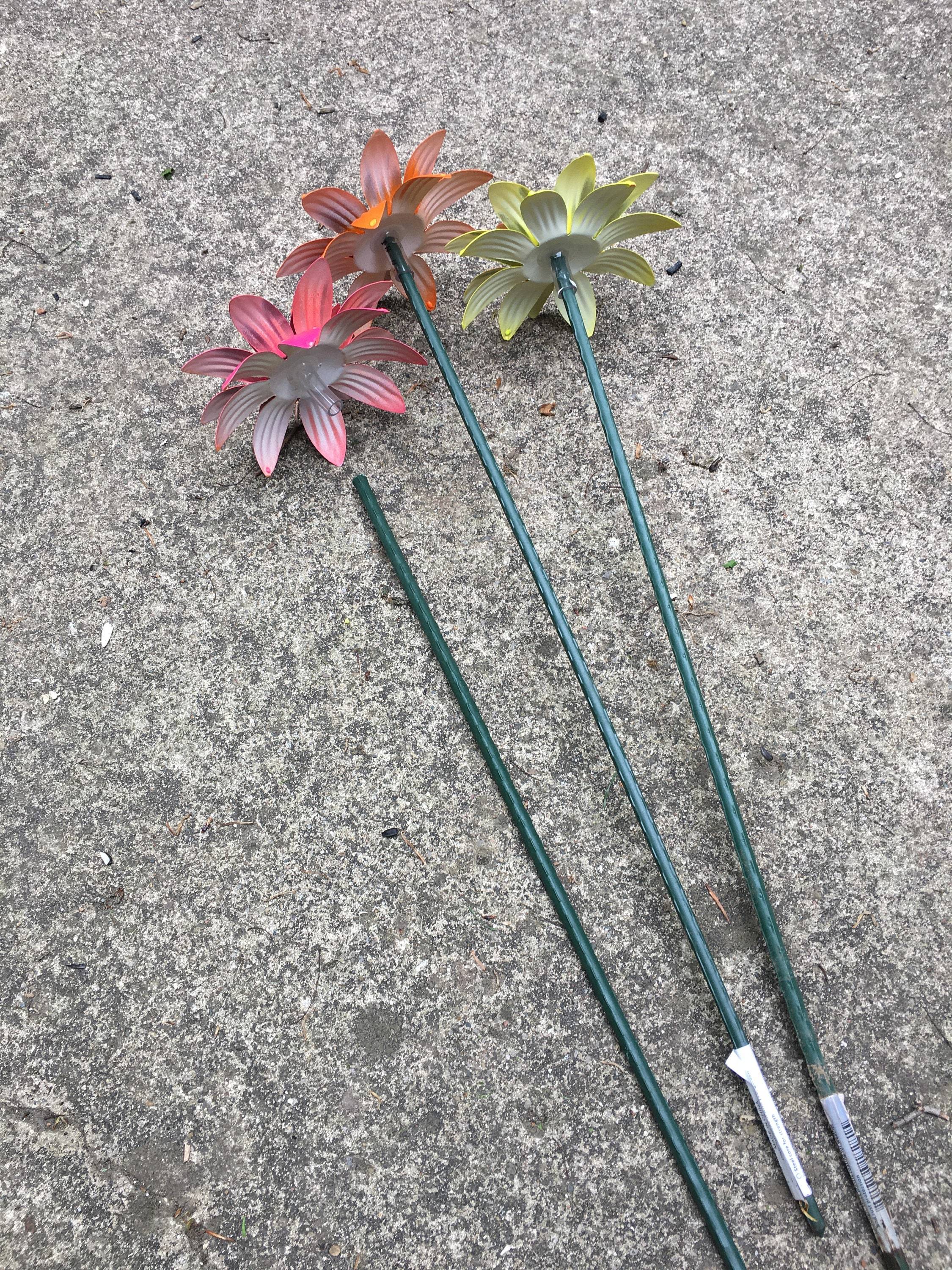 A Few Large Metal Garden Stakes