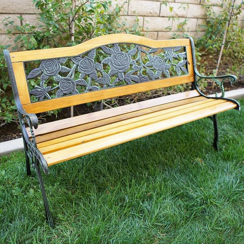 A Cast Iron And Wood Garden Bench