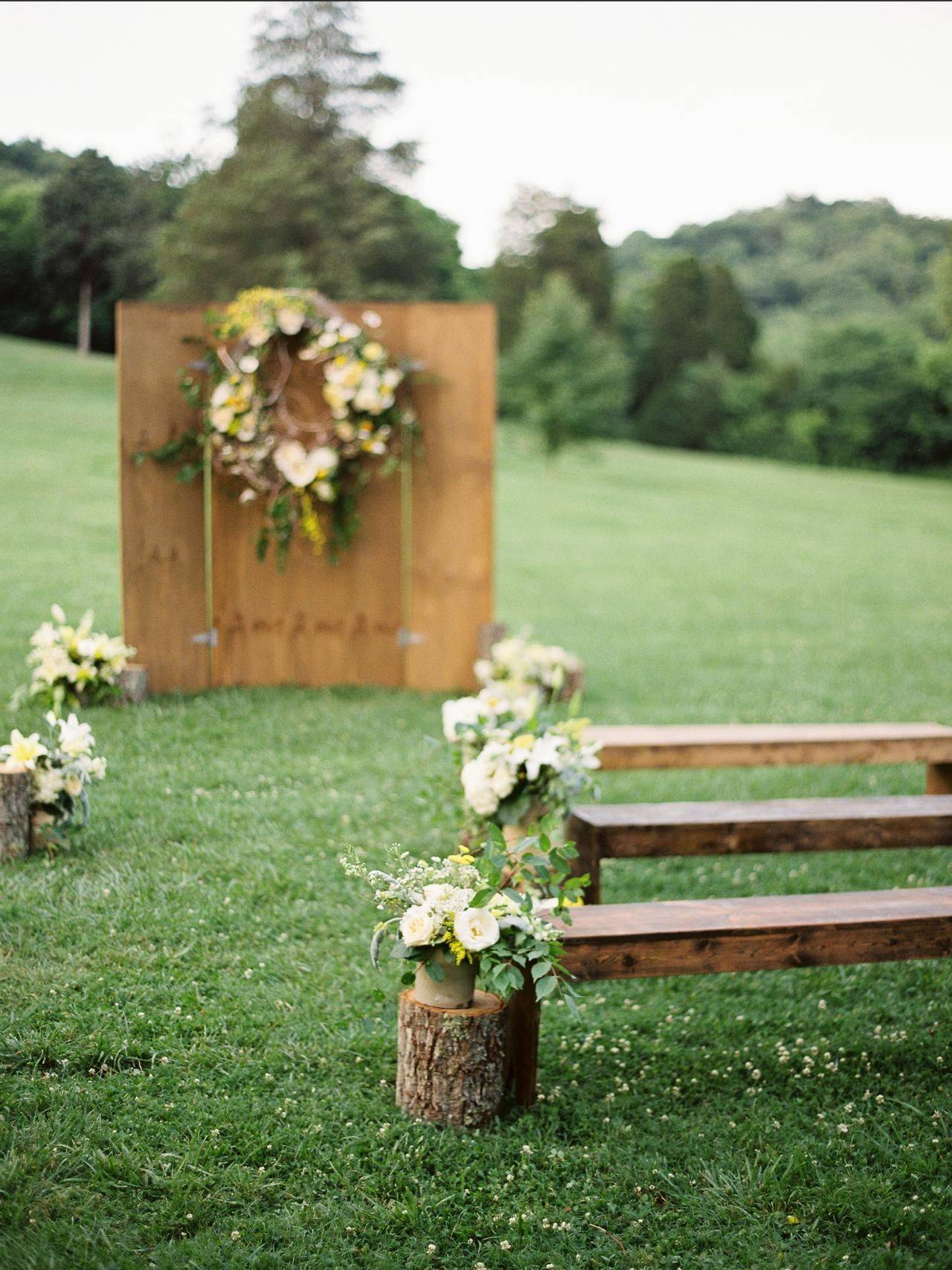 Rustic Wood And Overgrown White Floral Wedding Altar Decor