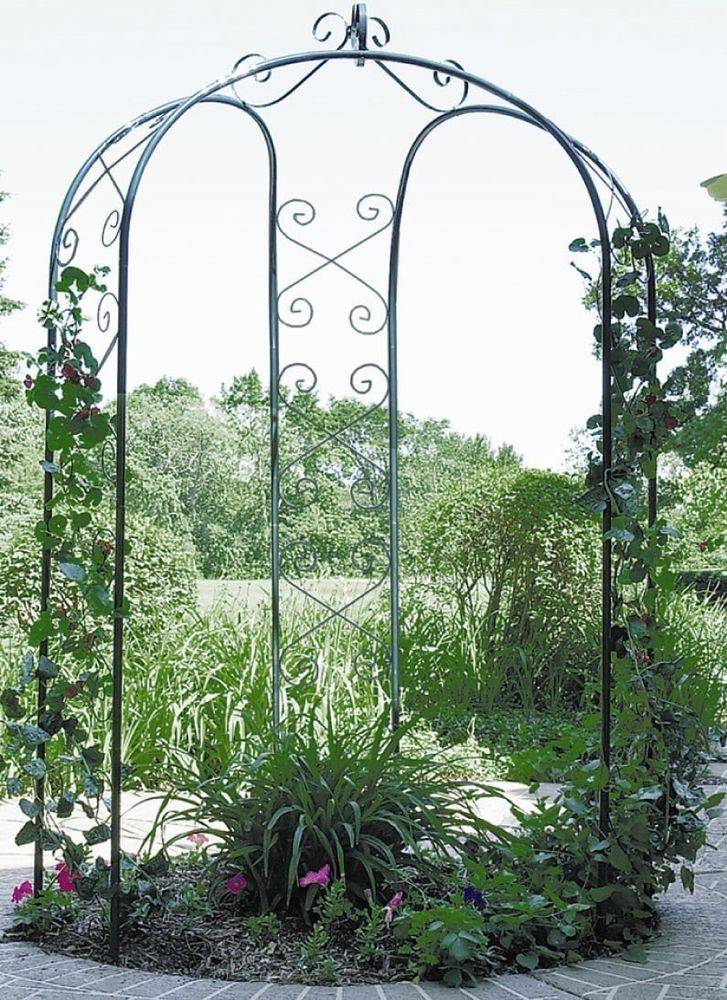 This Stunning Metal Peacockinspired Garden Trellis