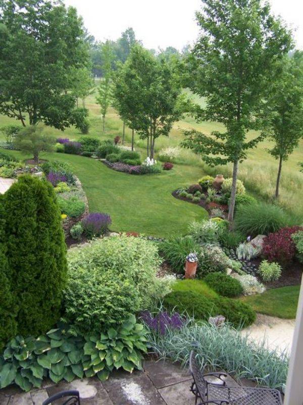 Terraced Rock Face Retaining Wall With Mini Golf Course Landscaping