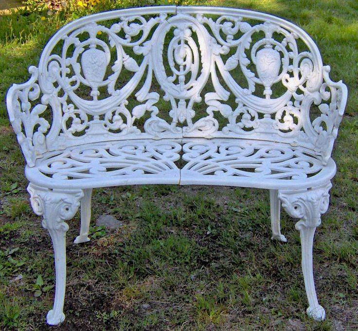 A Whitepainted Wroughtiron Two Seat Garden Bench Th Century