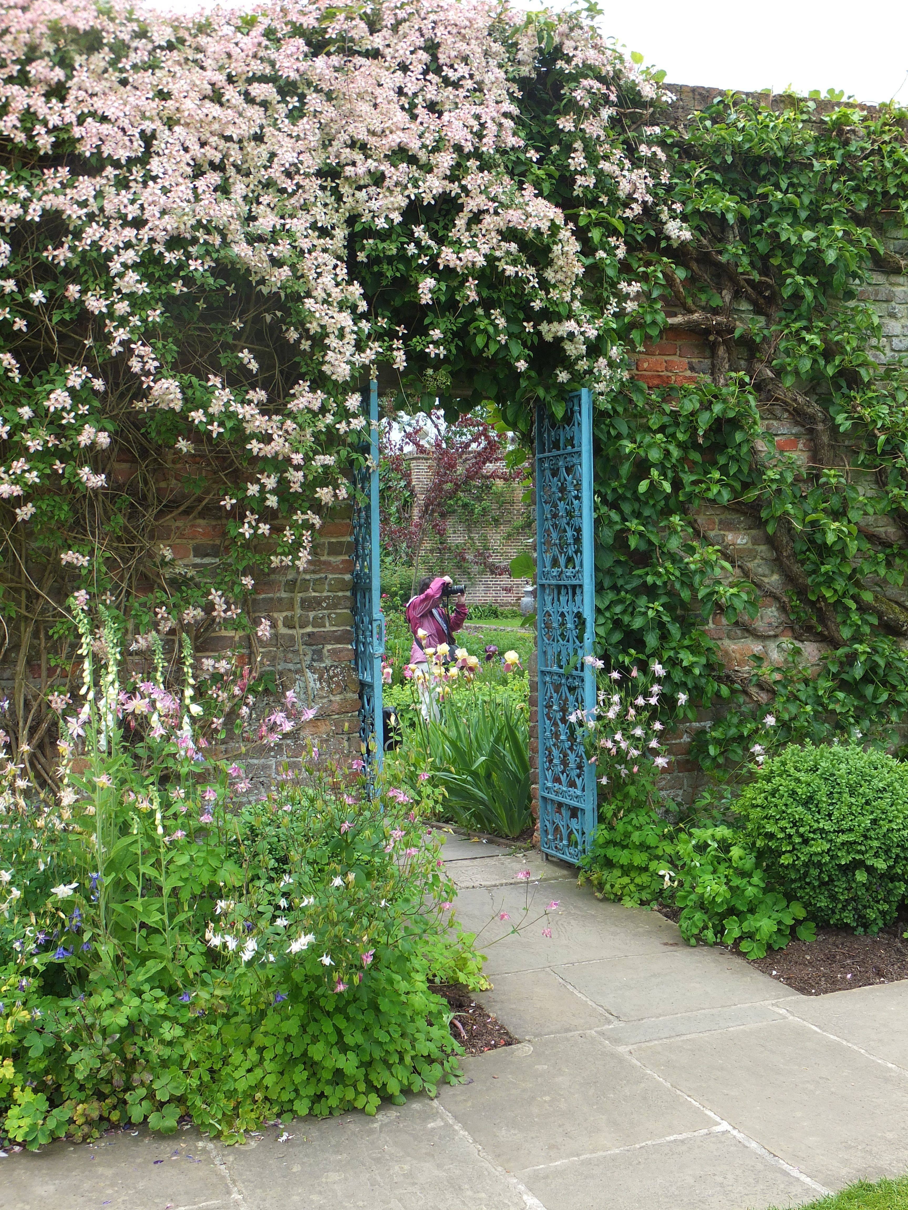 Arch And Path Beautiful Gardens