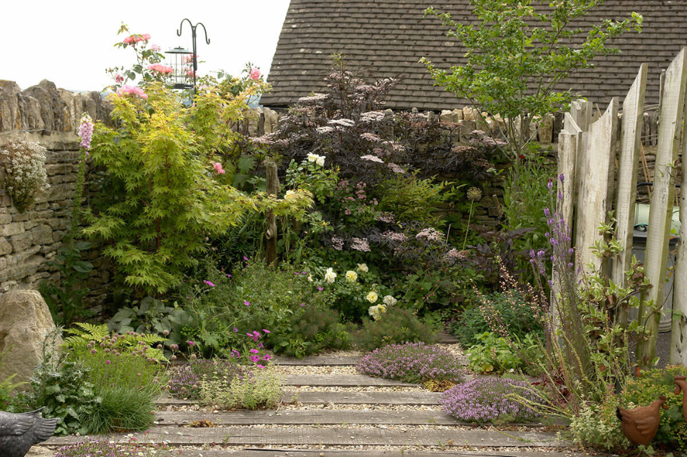 A Cotswold Or Cottage Garden