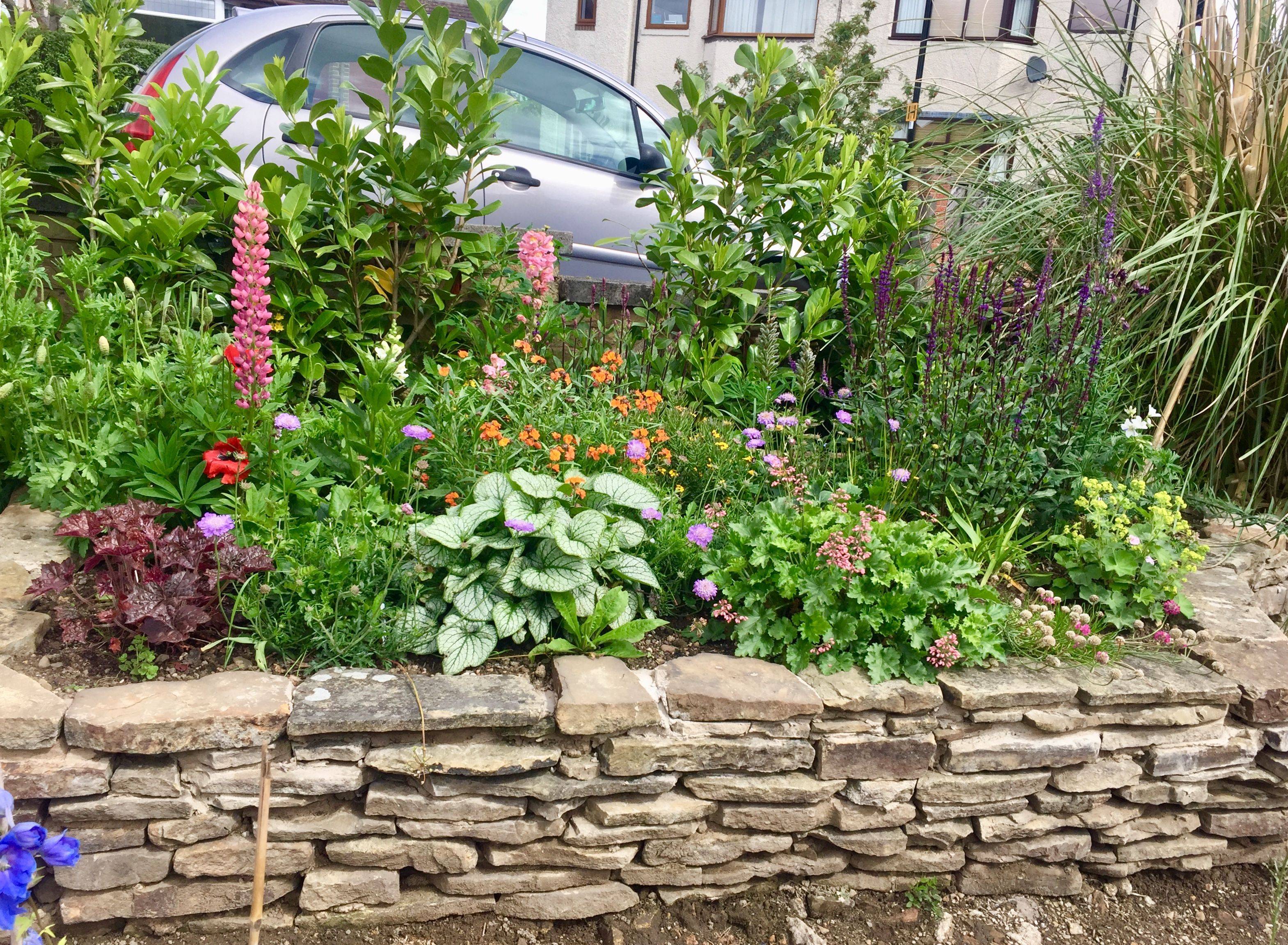 Beautiful Raised Flower Bed Stone Border