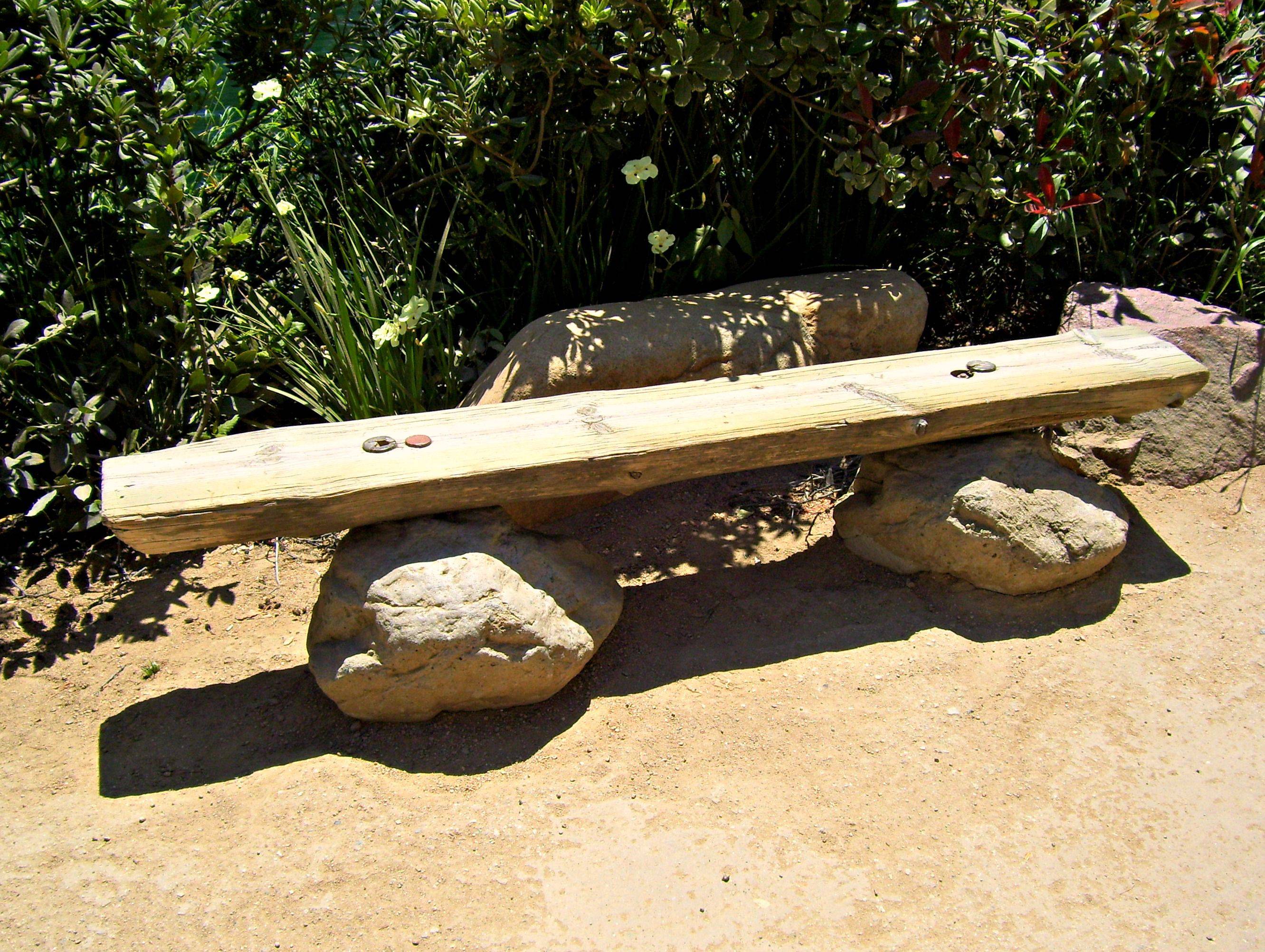The X Cast Stone Backless Garden Bench
