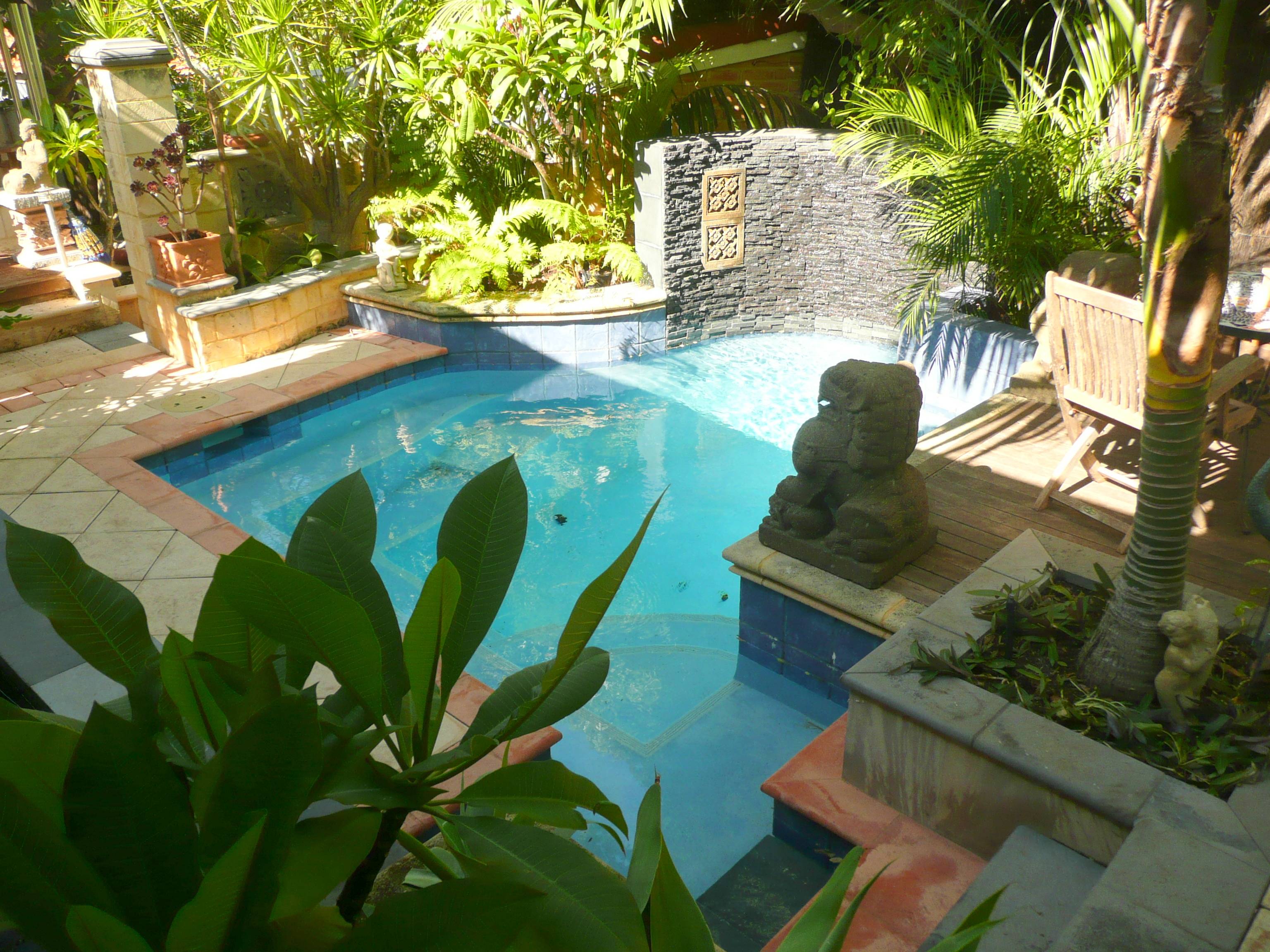 Simply Stylish A Classic Pool And Landscape Design Completehome