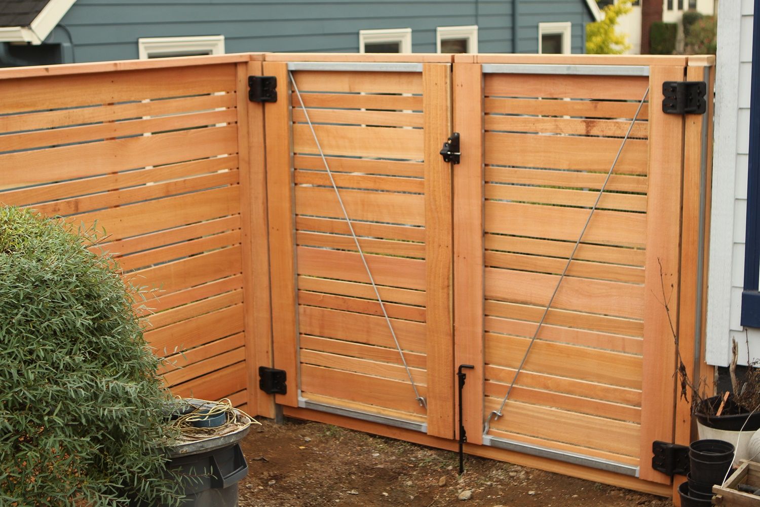 Marvellous Brown Color Wooden Concave Shape Double Swing Gate