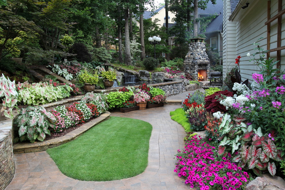 Lowmaintenancegardensraisedsleeperssandstonepatioturfinggarden