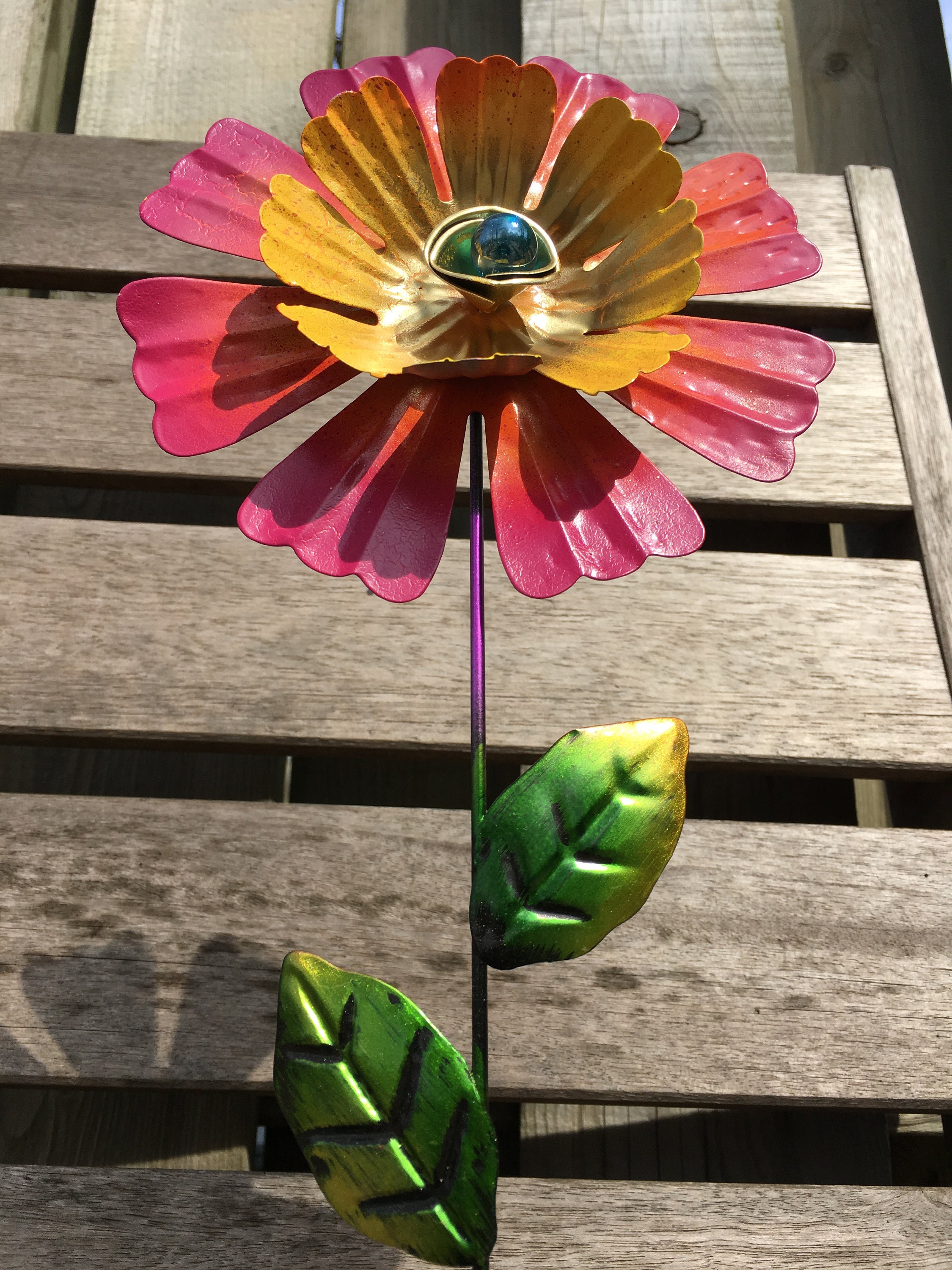 A Few Large Metal Garden Stakes