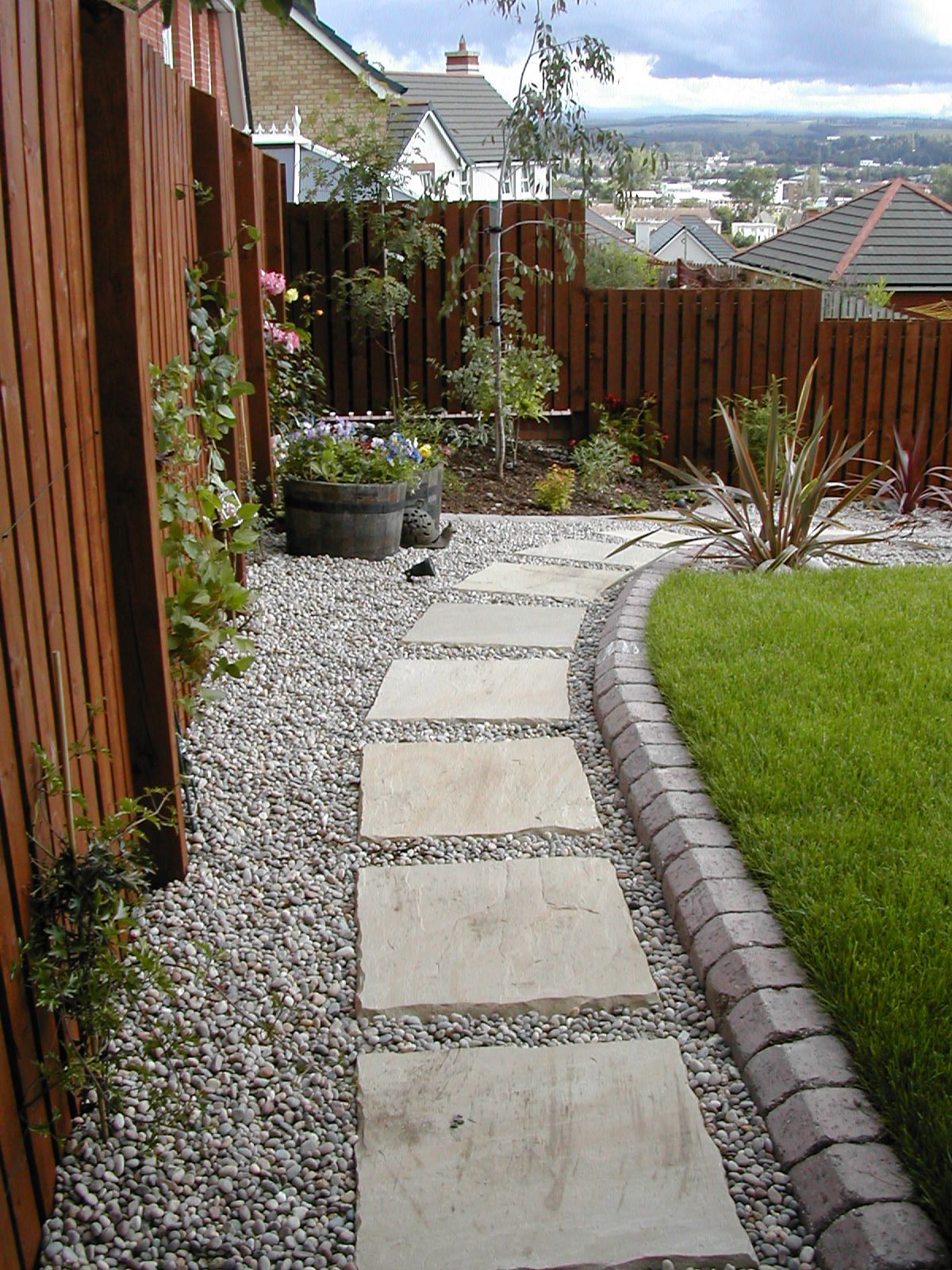 A Curved Stepping Stone Path Land Designs
