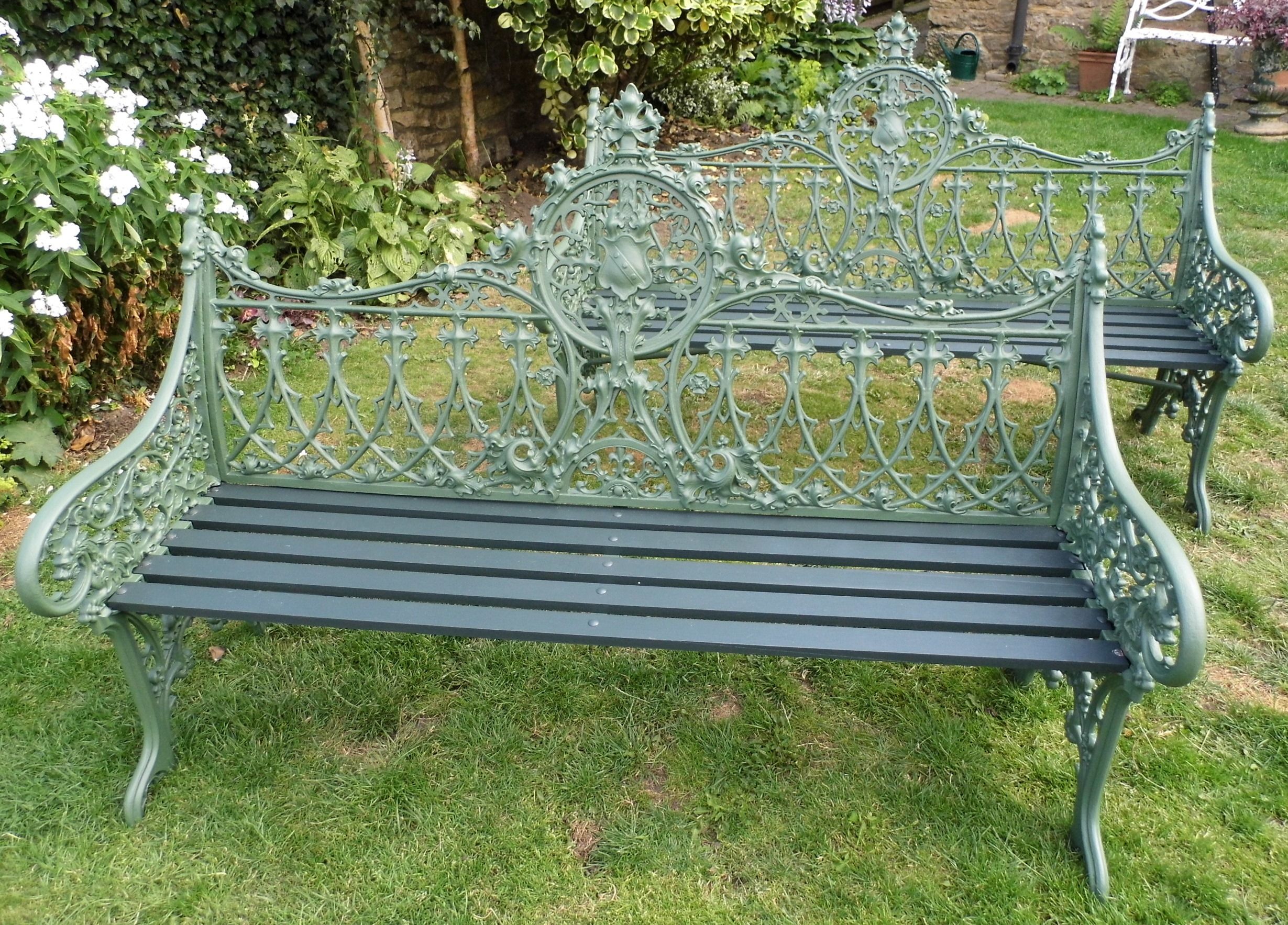 A Cast Iron And Wood Garden Bench